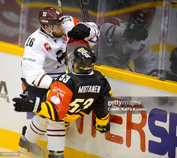 Big tackle between rival players during the Champions Hockey League game between KalPa Kuopio and Sparta Prague at Data Group Areena on August 21,...