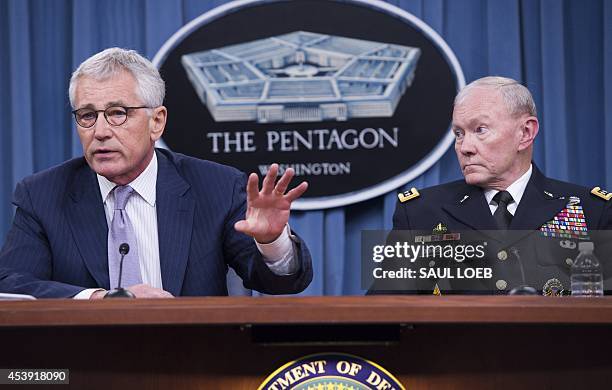 Secretary of Defense Chuck Hagel and Chairman of the Joint Chiefs of Staff General Martin Dempsey hold a press briefing at the Pentagon in...