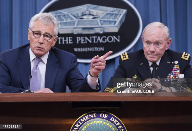 Secretary of Defense Chuck Hagel and Chairman of the Joint Chiefs of Staff General Martin Dempsey hold a press briefing at the Pentagon in...