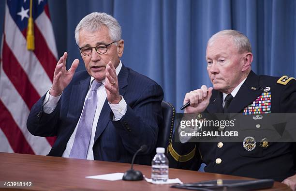 Secretary of Defense Chuck Hagel and Chairman of the Joint Chiefs of Staff General Martin Dempsey hold a press briefing at the Pentagon in...