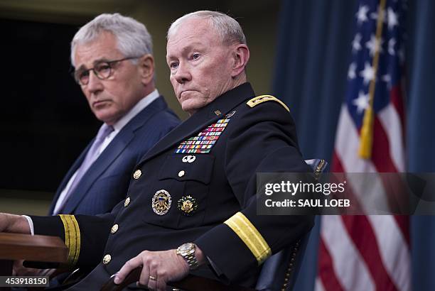 Secretary of Defense Chuck Hagel and Chairman of the Joint Chiefs of Staff General Martin Dempsey hold a press briefing at the Pentagon in...