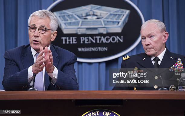 Secretary of Defense Chuck Hagel and Chairman of the Joint Chiefs of Staff General Martin Dempsey hold a press briefing at the Pentagon in...