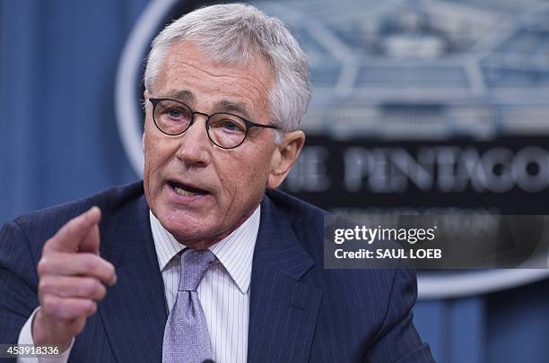 Secretary of Defense Chuck Hagel holds a press briefing at the Pentagon in Washington, DC, August 21, 2014. Hagel warned that the Islamic State is...