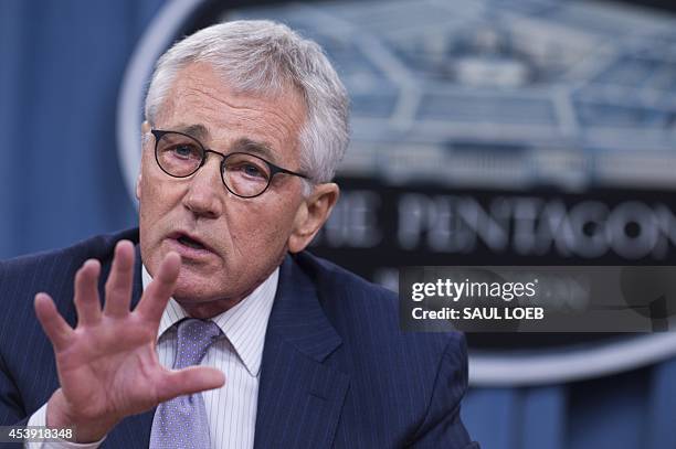 Secretary of Defense Chuck Hagel holds a press briefing at the Pentagon in Washington, DC, August 21, 2014. Hagel warned that the Islamic State is...