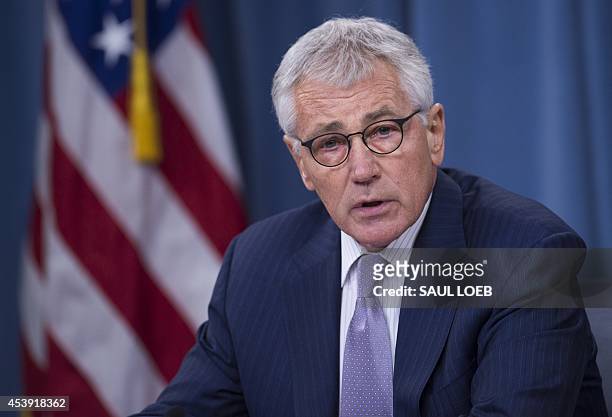 Secretary of Defense Chuck Hagel holds a press briefing at the Pentagon in Washington, DC, August 21, 2014. Hagel warned that the Islamic State is...