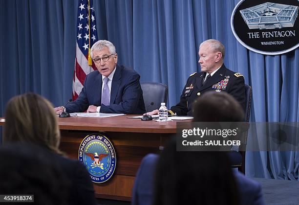 Secretary of Defense Chuck Hagel and Chairman of the Joint Chiefs of Staff General Martin Dempsey hold a press briefing at the Pentagon in...