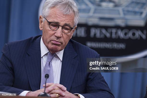 Secretary of Defense Chuck Hagel holds a press briefing at the Pentagon in Washington, DC, August 21, 2014. Hagel warned that the Islamic State is...