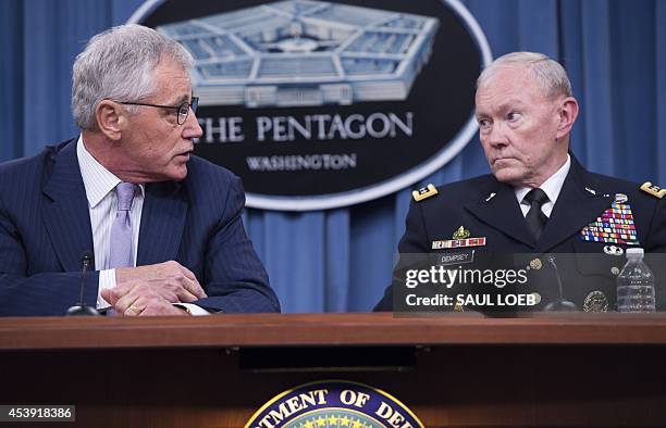 Secretary of Defense Chuck Hagel and Chairman of the Joint Chiefs of Staff General Martin Dempsey hold a press briefing at the Pentagon in...