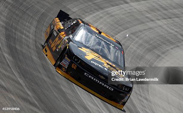 Brendan Gaughan, driver of the South Point Chevrolet, drives during practice for the NASCAR Nationwide Series Food City 300 at Bristol Motor Speedway...