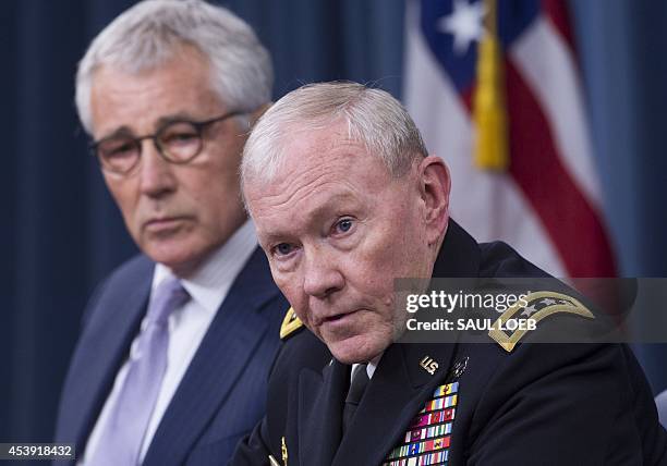 Secretary of Defense Chuck Hagel and Chairman of the Joint Chiefs of Staff General Martin Dempsey hold a press briefing at the Pentagon in...