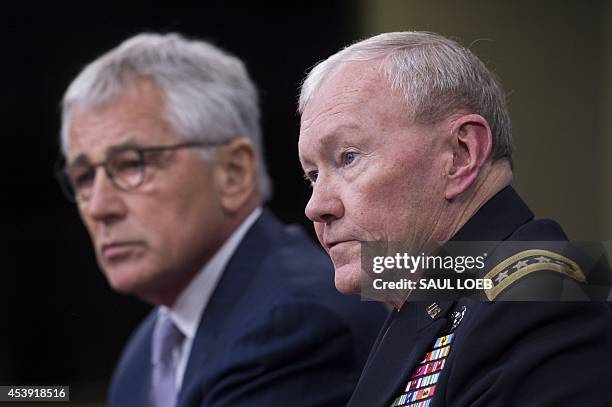 Secretary of Defense Chuck Hagel and Chairman of the Joint Chiefs of Staff General Martin Dempsey hold a press briefing at the Pentagon in...