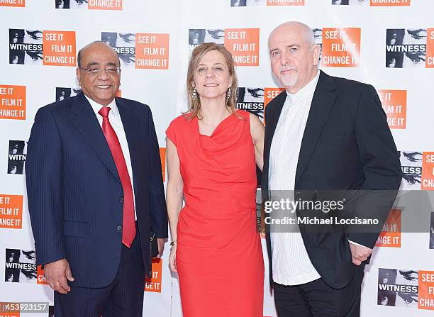 Honoree Dr. Mo Ibrahim, executive director of WITNESS Yvette Alberdingk Thijm and musician Peter Gabriel attend the 2013 Focus For Change gala...