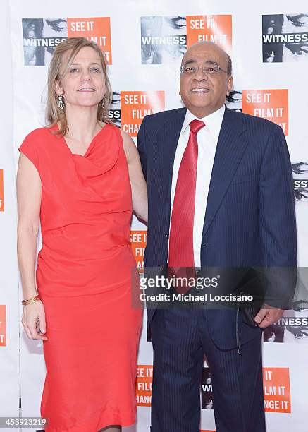 Honoree Dr. Mo Ibrahim and executive director of WITNESS Yvette Alberdingk Thijm attend the 2013 Focus For Change gala benefiting WITNESS at Roseland...