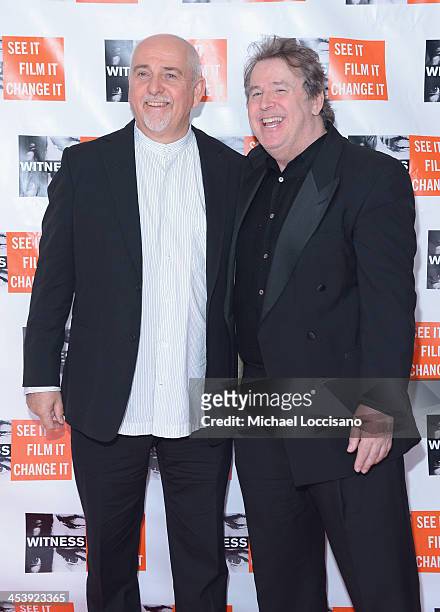Musician Peter Gabriel and Martin Lewis attend the 2013 Focus For Change gala benefiting WITNESS at Roseland Ballroom on December 5, 2013 in New York...