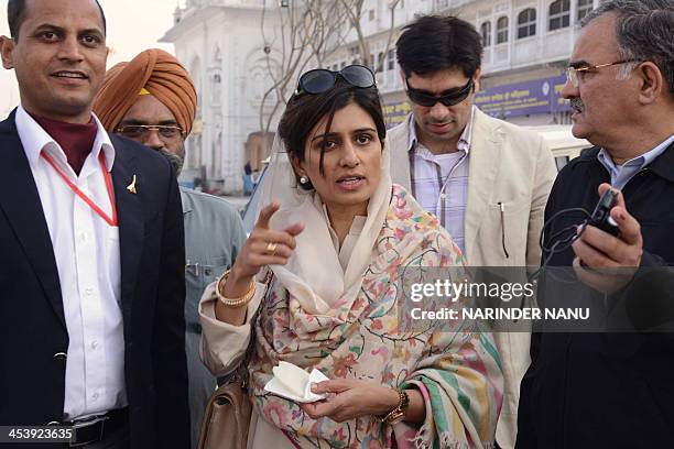 Pakistan Foreign Minister Hina Rabbani Khar visits the Sikh shrine Golden Temple in Amritsar on December 6, 2013. Khar visited the shrine and is in...