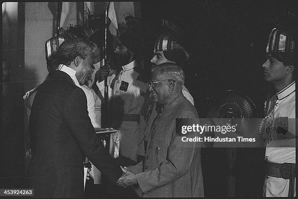 South African President Nelson Mandela receiving the Bharat Ratna Award from Indian President on October 16, 1990 in New Delhi, India. Revered icon...