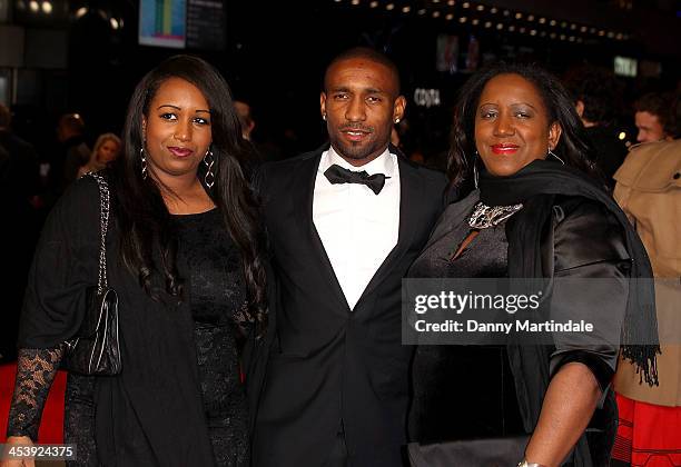 Jermain Defoe and his mother Sandra and sister Chonte attend the Royal film performance of "Mandela: Long Walk to Freedom" on December 5, 2013 in...