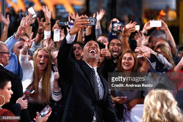 Dwayne Johnson attends the Europe premiere of Paramount Pictures 'Hercules' at CineStar on August 21, 2014 in Berlin, Germany.