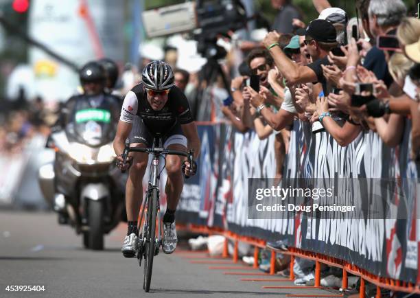 Fans cheer as Jens Voigt of Germany riding for Trek Factory Racing races in a solo breakaway during stage four of the 2014 USA Pro Challenge on...