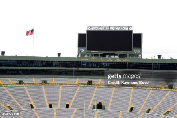 Retired numbers of former players are displayed at the North End of Lambeau Field, home of the Green Bay Packers football team on August 16, 2014 in...