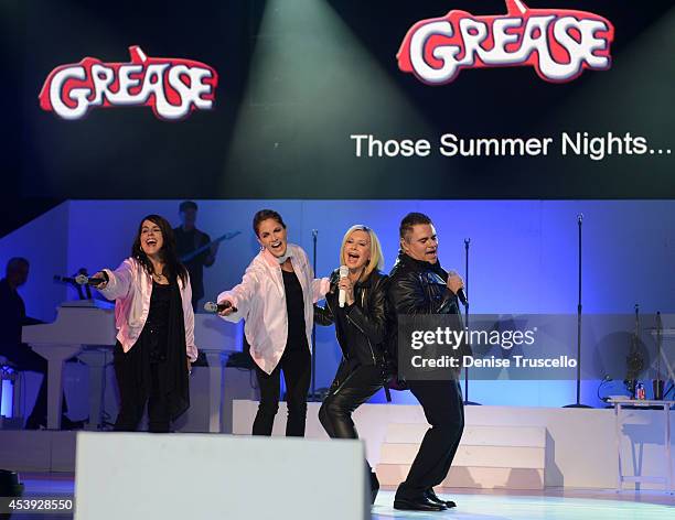 Marlen Landin, Natalie Morales, Olivia Newton-John and Steve Real perform during Olivia Newton-John's residency "Summer Nights" at the Flamingo Las...