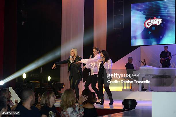 Olivia Newton-John, Natalie Morales and Marlen Landin perform during Olivia Newton-John's residency "Summer Nights" at the Flamingo Las Vegas on...
