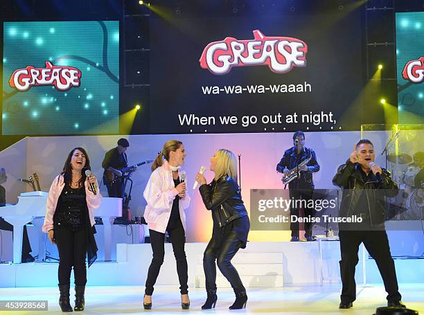 Marlen Landin, Natalie Morales, Olivia Newton-John and Steve Real perform during Olivia Newton-John's residency "Summer Nights" at the Flamingo Las...