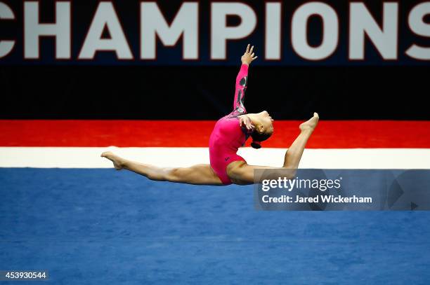Kyla Ross competes in the floor exercise of the senior women preliminaries during the 2014 P&G Gymnastics Championships at Consol Energy Center on...