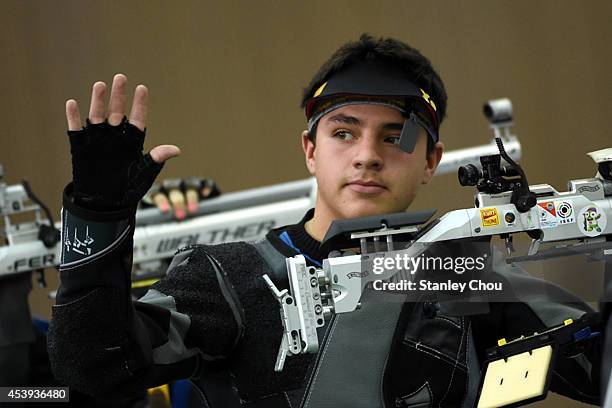 Jose Santos Valdes Martinez of Mexico waves during the 10m Air Rifle Mixed International Teams Gold Medal Competition at the Fangshan Shooting Hall...