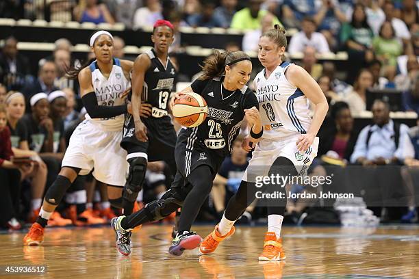 Becky Hammon of the San Antonio Stars attempts to drive on Lindsay Whalen of the Minnesota Lynx in Game One of the Western Conference Semifinals...