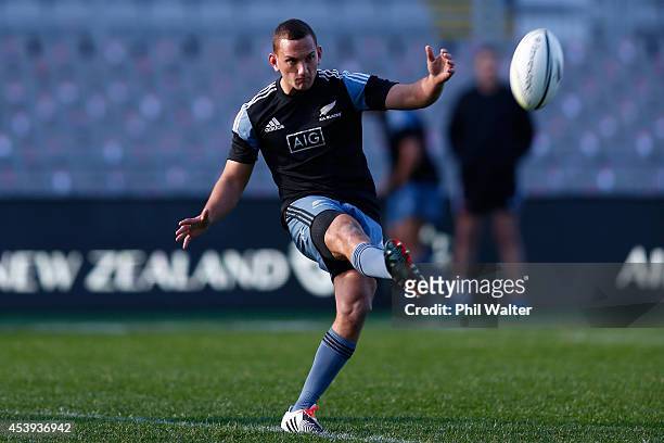 Aaron Cruden of the All Blacks kicks during the New Zealand All Blacks Captain's Run at Eden Park on August 22, 2014 in Auckland, New Zealand.