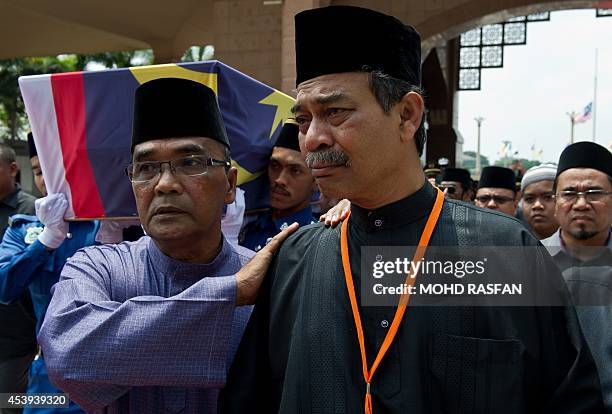 Mohamed Salleh, the father of Malaysia Airlines flight attendant Nur Shazana, one of the Malaysians who perished aboard flight MH17 that was downed...