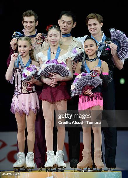 Maria Vigalova and Egor Zakroev of Russia, Xiaoyu Yu and Yang Jin of China and Lina Fedorova and Maxim Miroshkin of Russia stands on the podium for...