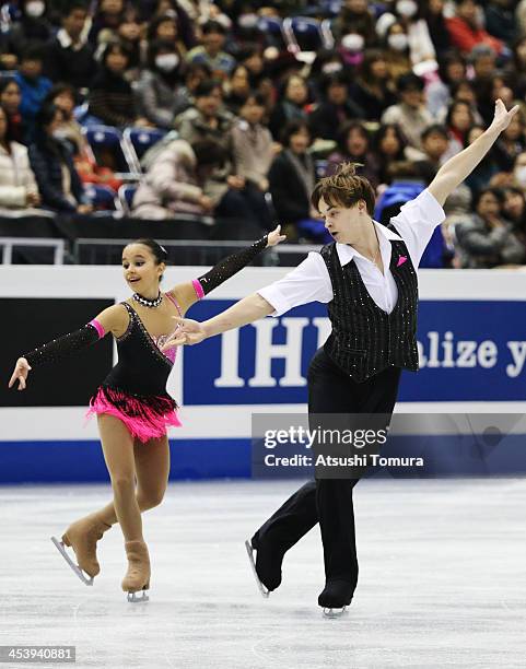 Xiaoyu Yu and Yang Jin of China compete in the Junior pairs free skating during day two of the ISU Grand Prix of Figure Skating Final 2013/2014 at...