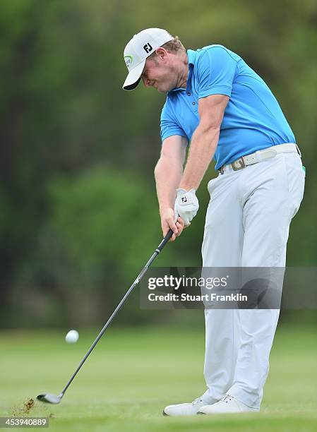 Jamie Donaldson of Wales plays a shot during the second round of the Nedbank Golf Challenge at Gary Player CC on December 6, 2013 in Sun City, South...