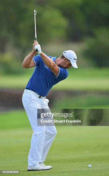 Henrik Stenson of Sweden plays a shot during the second round of the Nedbank Golf Challenge at Gary Player CC on December 6, 2013 in Sun City, South...