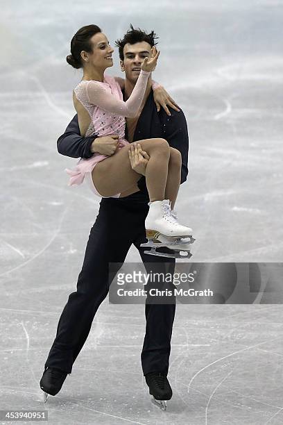 Meagan Duhamel and Eric Radford of Canada compete in the Pairs Short Program during day two of the ISU Grand Prix of Figure Skating Final 2013/2014...