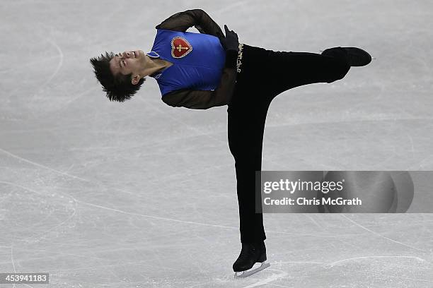 Ryuju Hino of Japan competes in the Junior Men's Free Skating during day two of the ISU Grand Prix of Figure Skating Final 2013/2014 at Marine Messe...