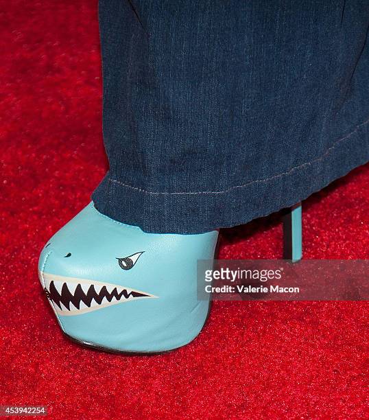 Actress Downtown Julie Brown arrives at the Premiere Of The Asylum & Fathom Events' "Sharknado 2: The Second One" at Regal Cinemas L.A. Live on...
