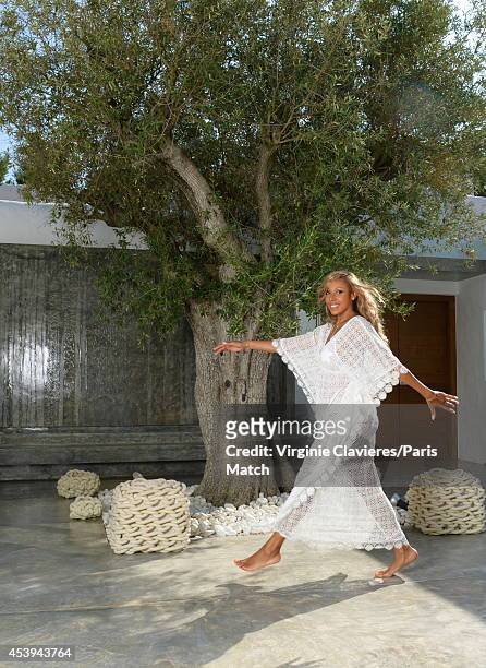 Socialite Cathy Guetta is photographed for Paris Match on August 12, 2014 in Ibiza, Spain.