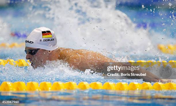 Steffen Deibler of Germany competes in the men's 100m butterfly heats during day 10 of the 32nd LEN European Swimming Championships 2014 at...