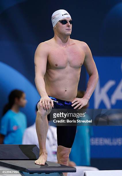 Steffen Deibler of Germany looks on prior to the men's 100m butterfly heats during day 10 of the 32nd LEN European Swimming Championships 2014 at...