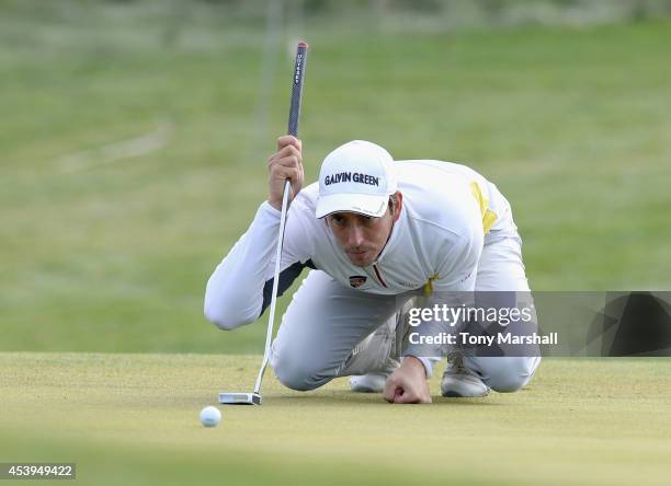 Jamie Elson of England lines up his putt on the 2nd green during day two of D+D REAL Czech Masters at Albatross Golf Resort on August 22, 2014 in...