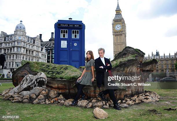 Peter Capaldi and Jenna Coleman attend a photocall ahead of the new BBC series of "Dr Who" in Parliament Square on August 22, 2014 in London, England.