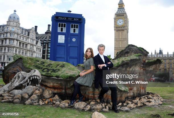Peter Capaldi and Jenna Coleman attend a photocall ahead of the new BBC series of "Dr Who" in Parliament Square on August 22, 2014 in London, England.