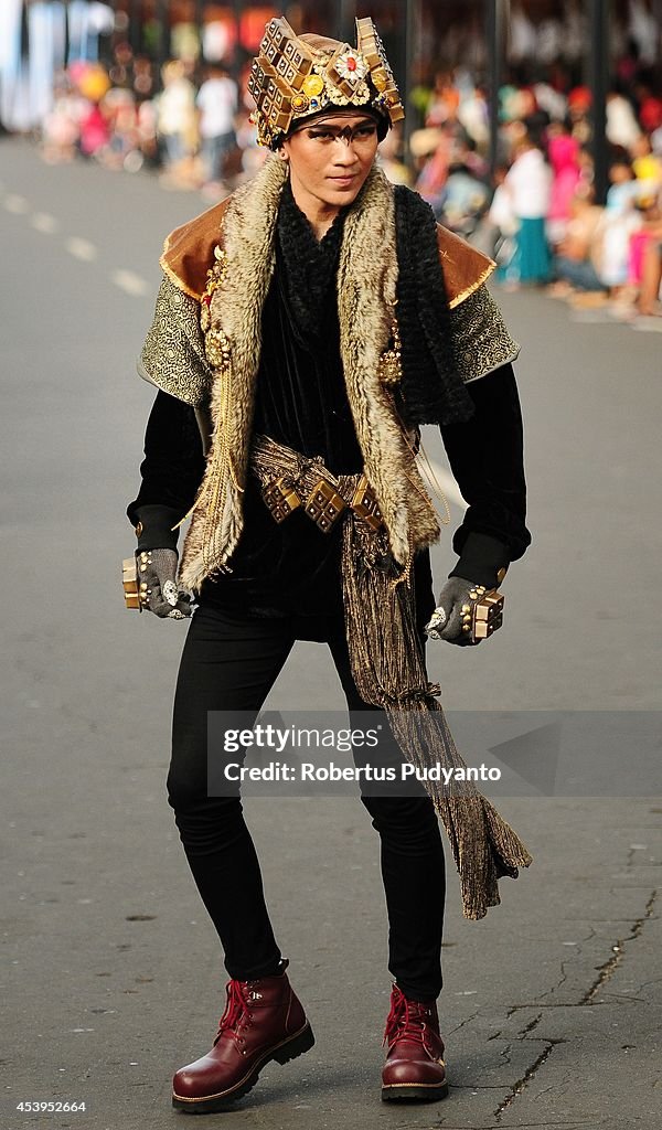 Revellers Gather For The 13th Jember Fashion Carnival 2014