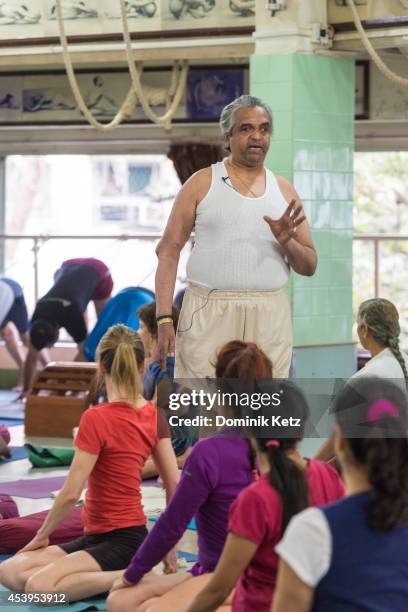 Prashant Iyengar seen teaching a yoga class at the B.K.S. Iyengar Memorial Yoga Institute in March of 2012 in Pune, India.