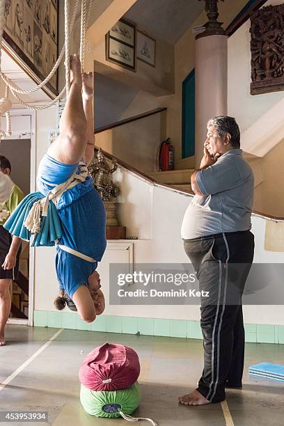 Prashant Iyengar seen teaching a yoga class at the B.K.S. Iyengar Memorial Yoga Institute in March of 2012 in Pune, India.