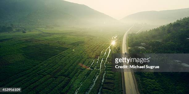 rwanda landscape - africa road stock pictures, royalty-free photos & images