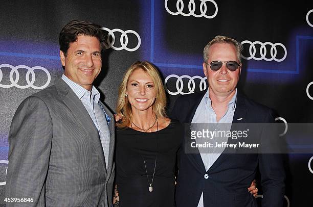 Writer/producer Steven Levitan, Krista Levitan and guest arrive at the Audi Emmy Week Celebration at Cecconi's Restaurant on August 21, 2014 in Los...